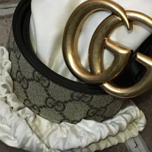 Gucci blue & tan belt with Double g motif all around the body of the belt